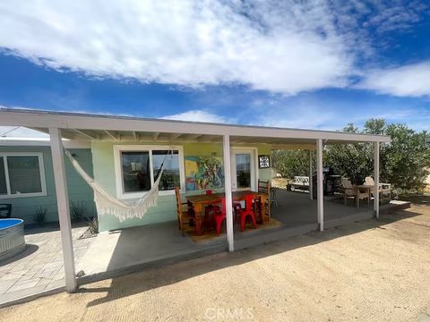 Photo of 4319 Dusty Mile Road, Landers, CA 92285 (MLS # IG26070085)