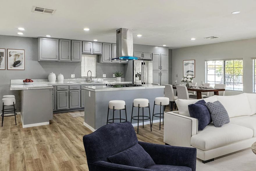 JUST REDUCED! Beautiful and elegant designer remodel in Date Palm Country Club a 55+ community.  Enter into an open floor plan great room with a sitting/TV area, one formal dining area and one casual dining area, kitchen with breakfast bar and center island, new stainless streel appliances including convection oven and 54 bottle wine cooler...perfect living space for cooking, eating and entertaining.  2 bedrooms with en suite bathrooms plus a bonus room-office/bed/den.  Remodel from top to bottom included new luxury waterproof vinyl plank flooring throughout, redone walls and ceilings with recessed lighting on dimmers, double pane windows all with custom blinds and redone bathrooms with rain showers.  Private backyard with gazebo and barbecue area all enclosed so perfect for your four-legged friends.  Laundry room leading too outside storage shed and parking for 4 cars plus golf cart.  This home has the best location across from the pool and spa, near the guarded front gate for easy access and to the 24 hours Casino.  Amenities include: 18 hole executive golf course, driving range and putting green, 4 pickle ball courts, tennis courts, gym and doggie park.  Main pool area has a building for private parties with bar, pool tables and table tennis. On site Nick's Bistro and bar with free home delivery.