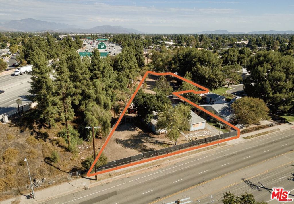 Photo of 10810 Woodley Avenue, Los Angeles, CA 91344 (MLS # 26986157)