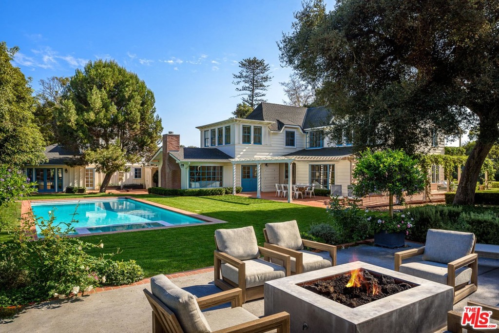Originally built in 1900 this Monterey Colonial was redone in 2015 with quality finishes. Present owners added pool and fantastic outdoor "room" that comes fully equipped with fire pit, built in barbecue, and outdoor TV. The new landscaping offers seasonal blooms, oak trees and lawns. There is a tiny orchard with room to expand. The property is comprised of main house with 4 bedrooms, formal dining room, kitchen/family room and living room open to pool and grounds. Guest house includes a living room with FP, full kitchen, plus 3 bedrooms with 2 baths. There is an additional one bedroom suite adjacent to the main house perfect as an office, live-in nanny suite, or additional guest space. There are 5 garage spaces with two currently used as a gym. A part of Montecito history with all the upgrades for 2021 living.