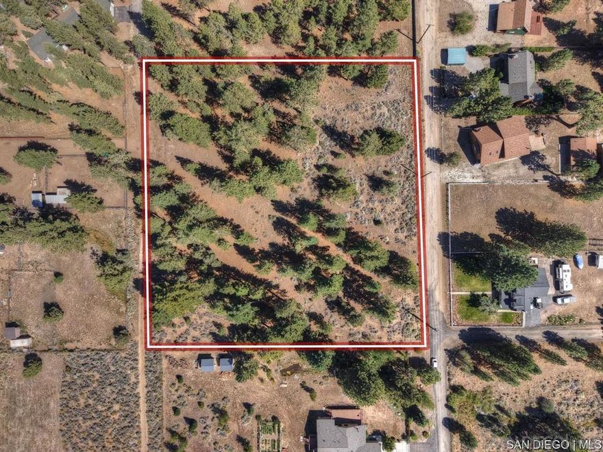 A perfect investment for building your new mountain home on this nicely treed 2.5-acre parcel on level terrain with street-to-street access. Measures 330 x 330. No CCRs to restrict building and NO HOA FEES. Quiet neighborhood and easy year-round access with equestrian zoning and access to the PCT riding trail near by. All utilities are available for new constuction including natural gas, electric, water, cable service and sewer in the street. **