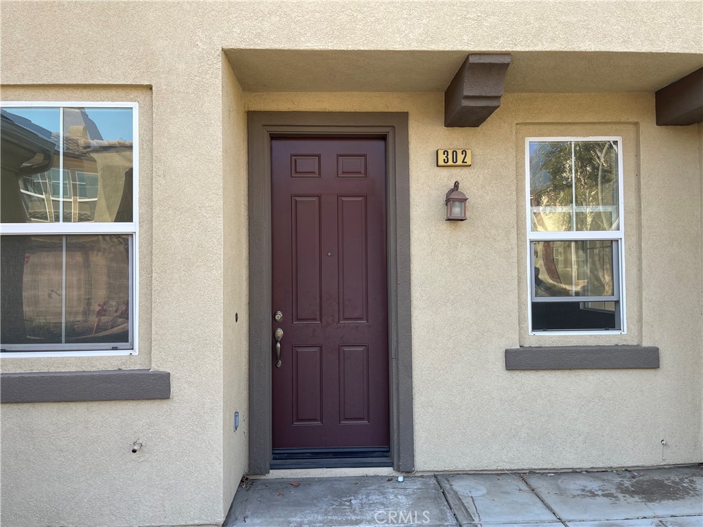 Adorable Move In ready Condo. 3 upstairs bedrooms, 2.5 Bedrooms. Brand New carpeting throughout and freshly painted interior including garage. Brand new stainless steel stove, dishwasher and Hood. Stacked washer and dryer included. Two attached car garage. Front porch/patio Area. Community swimming pool and, Tot Lot and Picnic Area.