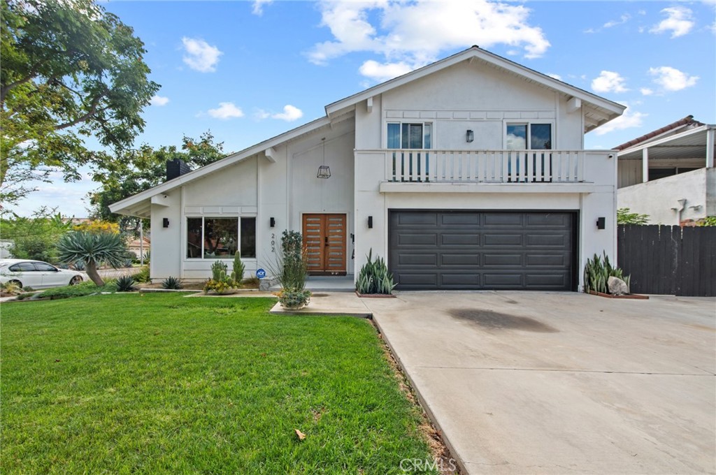 Modern Living on a Spacious Corner Lot – Fully Renovated & Move-In Ready!
Set on a desirable corner lot, this beautifully upgraded home offers a rare blend of style, comfort, and functionality in a prime location. From the moment you arrive, you'll notice the newly designed front and rear landscaping, along with a private backyard and an expansive second-story deck—perfect for entertaining guests or unwinding in peace.
Step inside to a bright, open interior featuring brand-new tile flooring on the main level, luxury vinyl floors upstairs, and a striking hardwood staircase with a modern glass railing. The entire home is enhanced by recessed lighting and a custom-built entertainment center in the living room.
The heart of the home is the fully remodeled kitchen, showcasing sleek quartz countertops, classic white shaker cabinets, and stainless-steel appliances—a true chef’s delight. All bathrooms have been tastefully renovated less than three years, offering a fresh, contemporary vibe.
With four bedrooms and three full bathrooms, this home is designed with flexibility in mind. The layout includes a convenient downstairs bedroom and full bath—ideal for guests or multi-generational living—while upstairs you’ll find three additional bedrooms, including a spacious primary suite complete with a custom walk-in closet.
Additional highlights include Built-in water softener, new window blinds, Quiet Street location near Sandpointe Park, just 5 minutes from South Coast Plaza, Easy access to the 405, 55, and 73 freeways.
This is more than just a house—it's a thoughtfully upgraded home in one of the area's most convenient neighborhoods. Don't miss your chance to own this turnkey gem!