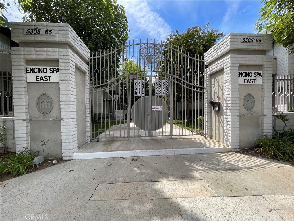 Welcome to this stunningly reimagined modern townhouse in the highly sought-after Encino Spa East community! Offering over 1,700 sq. ft. of thoughtfully redesigned living space, this home combines style, comfort, and sophistication in every detail.
The inviting living room boasts soaring vaulted ceilings, a cozy fireplace, and seamless flow into the chic dining area and chef’s kitchen. The kitchen is a true showpiece, featuring custom cabinetry, a breakfast bar, and designer finishes—perfect for both everyday living and entertaining. Sleek tile flooring runs throughout the first level, complemented by a beautifully remodeled powder room and a private patio for indoor-outdoor enjoyment.
Upstairs, the luxurious primary suite offers vaulted ceilings, its own private balcony, dual closets, and a spa-inspired bathroom. The secondary suite is equally impressive with its own full bath, while a versatile loft/den provides the ideal flex space for an office, reading nook, or media area.
This freshly painted, move-in ready home also includes access to resort-style amenities: gated entry, sparkling pool & spa, clubhouse, fitness center, and more. HOA dues conveniently cover water, basic cable, high speed internet and earthquake insurance.
Located just moments from Ventura Blvd’s vibrant shopping, dining, and nightlife, this home blends modern upgrades with an unbeatable location. Don’t miss this opportunity to call Encino Spa East your new home!
List of Improvements
• Kitchen: Fully remodeled with custom cabinetry, designer finishes, and breakfast bar
• Flooring: Sleek tile flooring throughout the first & second level
• Powder Room: Fully remodeled with high-end finishes
• Primary Suite: Spa-like bathroom with modern upgrades, vaulted ceilings, and private balcony
• Interior: Freshly painted throughout
• Additional Features: Updated lighting and fixtures for a modern touch
