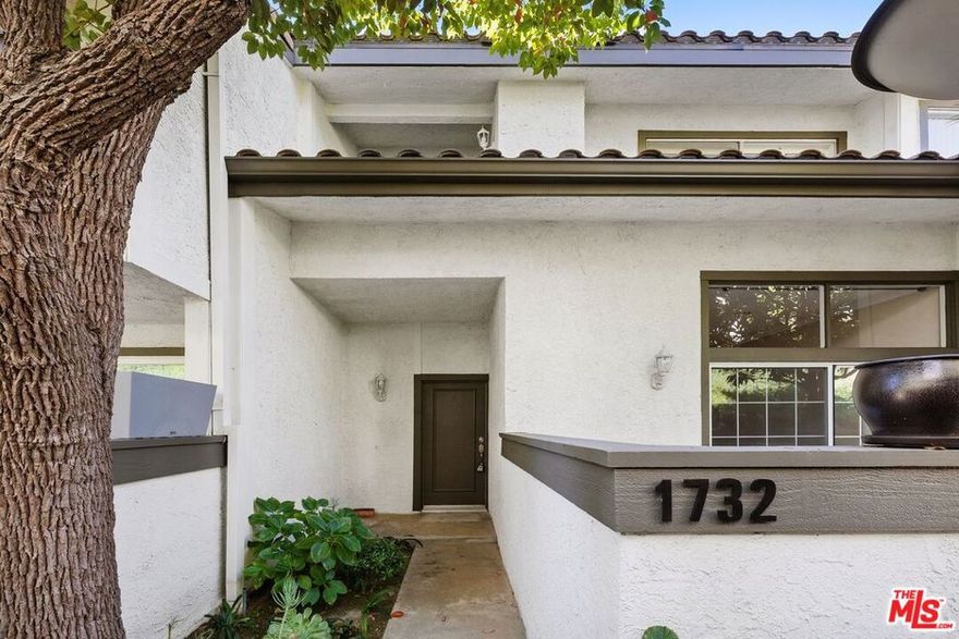 Spacious 1720 sq ft  - 2 Bed / 2.5 Bath Townhouse in the Palisades Highlands. Enjoy resort-style living in this beautifully maintained townhouse featuring an open floor plan and abundant natural light. The large eat-in kitchen includes travertine tile, stainless-steel gas appliances, and plenty of counter space, perfect for cooking and entertaining. The expansive master suite offers soaring ceilings, a walk-in closet, and a private balcony. The generous second bedroom includes a jacuzzi tub and mountain views. Additional features include a built-in office space, a separate dining room, and a bright living room that opens to a private patio. Washer/dryer on the second level and an attached large two-car garage provide everyday convenience. The community offers tennis courts, pool, jacuzzi, sauna, and gym, all set in a serene, well-kept complex. Located in the sunny Palisades Highlands near scenic hiking trails and just minutes to the beach, Santa Monica, Malibu, and the Westside.