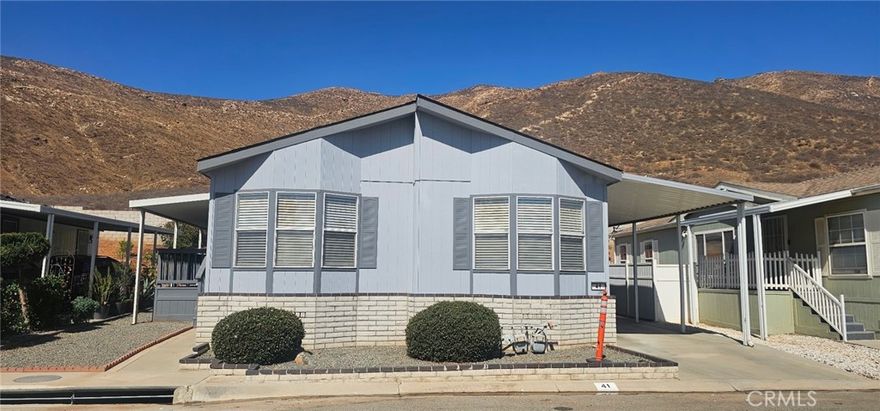Welcome to this beautiful updated mobile home located in the highly desired area in Jurupa Valley. Home features 3 bedrooms, 2 baths with a spacious living room and kitchen.  Quiet community of Santiago Estates Park with amazing views, a nice club house, well-maintained swimming pool, playground, and recreation facilities. Less than 15 minutes away from UCR and Downtown Riverside. A must See!!!