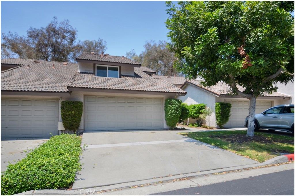 Welcome to 2656 Monterey Place in the desirable Sunny Ridge community of Fullerton!
This beautifully maintained 3-bedroom, 2.5-bathroom townhome offers comfort, convenience, and charm in a prime location. The spacious layout features warm wood flooring throughout the downstairs, a cozy living room with a fireplace, and a light-filled dining area that opens to a private patio—perfect for relaxing or entertaining while enjoying serene views of the park and greenbelt.
The kitchen offers plenty of cabinet space and flows seamlessly into the main living areas. Upstairs, the spacious master suite includes a walk-in closet and an en-suite bath, while two additional bedrooms provide flexibility for family, guests, or a home office. Additional highlights include a 2-car attached garage with a long driveway and direct access, central HVAC, and inside laundry.
Enjoy resort-style living with access to the community pool and spa, and take advantage of being located in the highly sought-after Sunny Hills High School district. With parks, shopping, dining, and top-rated schools nearby, this home truly offers the best of Orange County living.
Don’t miss this rare opportunity to own a home in one of Fullerton’s most coveted neighborhoods!