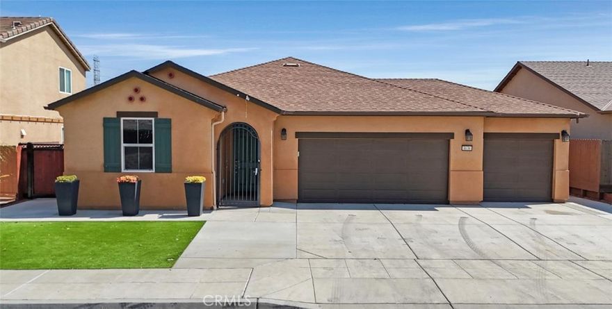Take a look at this beautiful home in North-West Fresno, nestled in a family-friendly neighborhood and loaded with upgrades! Enjoy the convenience of a finished 3-car garage, custom wrought iron security gate, low-maintenance turf front yard, modern LVP flooring, tented windows for added efficiency, and a large storage shed. The open great room is perfect for gatherings, featuring a stunning kitchen with a spacious island, granite countertops, stainless steel appliances, and ample cabinetry. Natural light fills the dining and living areas, creating a warm and inviting atmosphere. Bedrooms offer generous closets, while bathrooms have been meticulously maintained. Step outside to a backyard designed for both relaxation and function, complete with a covered patio, grassy area, spacious side yards with iron fencing ideal for a dog run, and plenty of storage. Don't miss this move-in ready gem, schedule your private showing today!