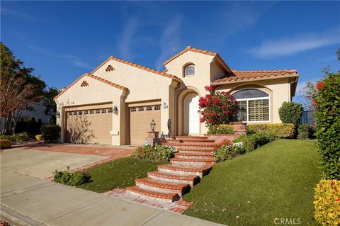 Photo of 25119 Smokewood Way, Stevenson Ranch, CA 91381 (MLS # GD25281256)