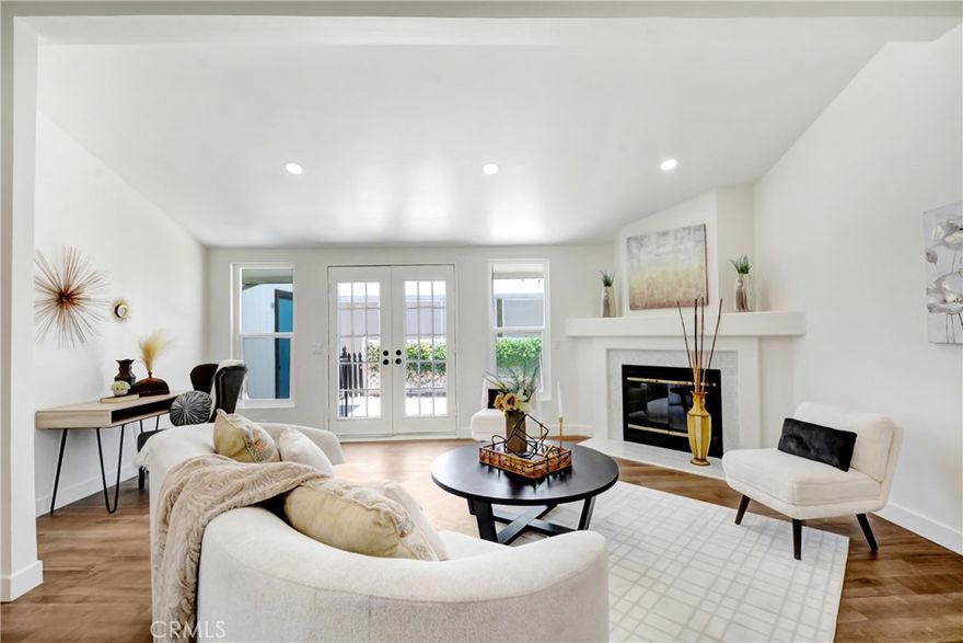 Welcome to 1730 San Simeon Drive, where high-end renovation meets unbeatable value. This beautifully remodeled triple-wide home on owned land in Sierra Dawn Estates is truly one of a kind. A new roof, repipe, and full renovation provide peace of mind and modern comfort—paired with a price point that makes this one of the strongest values in the entire neighborhood. This 2 bedroom, 2 bath property features a rare attached 2-car garage and the spacious design only a triple-wide can offer. Step inside to an airy open floor plan with vaulted ceilings, designer finishes, and wide-plank luxury vinyl flooring throughout. Large windows and French doors fill the space with natural light, creating a warm and inviting atmosphere. The completely remodeled kitchen is the heart of the home, showcasing soft-close shaker cabinets, quartz countertops, stainless steel appliances, and an oversized island that opens to a second living area perfect for entertaining family and friends. The formal dining room includes a built-in buffet with mirrored shelving, adding both storage and style. The primary suite offers a true retreat with a freestanding soaking tub, walk-in shower, and dual vanities. A large laundry room provides additional cabinetry, a quartz folding counter, and a utility sink. The attached garage offers convenience and rare storage, while the bonus sitting area features mountain views and a quiet place to unwind. This home is 433A certified and eligible for Conventional, FHA, and VA financing. HOA dues are just $168 per month and include access to multiple pools, spas, dog parks, and clubhouses in one of Hemet’s most desirable 55+ communities. Every major system has been upgraded for ease of ownership, and the home showcases meticulous attention to detail throughout. Move right in and enjoy the comfort and quality of a high-end renovation without the premium price tag. Homes like this—triple-wide, on owned land, fully renovated, and with a two-car garage—rarely come to market. Don’t wait. Schedule your showing today and experience one of the best values in Sierra Dawn Estates.