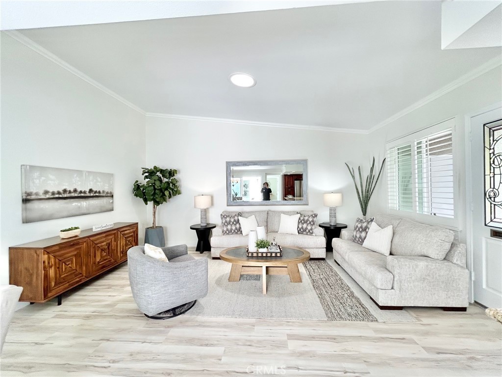 Imagine living in a beautifully remodeled 2-bedroom, 1-bathroom Cottage in the heart of Southern California's best-known climate, Orange County, for under $450K! The unit was fully remodeled in 2011, with new luxury vinyl plank flooring and fresh neutral-colored wall paint completed just a few weeks ago. It features an open-concept kitchen with stainless steel appliances, granite countertops, smooth ceilings, dual-pane windows, and sliding doors throughout. The large bathroom has been reconfigured to include a large bath, stall shower, washer/dryer, and a large skylight, with an additional door to the Master bathroom, creating a suite-like feel. Enjoy the extra door from the Master bedroom to the patio. Master bedroom has a separate heat pump with a remote control. The unit also features a lovely atrium and three solar tubes that provide plenty of natural light. Set in a peaceful, quiet area, this home offers a tranquil retreat, with a covered carport and guest parking nearby. Located within Laguna Woods Village, residents have access to a wide range of amenities, including Clubhouse 1 with an Olympic-sized swimming pool, Bocce Club, gym, archery range, and more. Enjoy the 27-hole championship golf course, 9-hole par-3 course, driving range, seven clubhouses, five swimming pools, a state-of-the-art fitness center, tennis and pickleball courts, walking trails, and arts & crafts studios. Laguna Woods is a gated 55+ community, just minutes from Laguna Beach and the Pacific Ocean.
PROFESSIONAL photos and a virtual tour will be upload Saturda, August 2nd