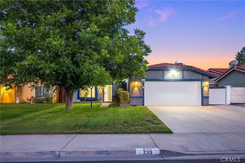 Photo of 235 Laurelwood Lane, Lake Elsinore, CA 92530 (MLS # IV26132063)