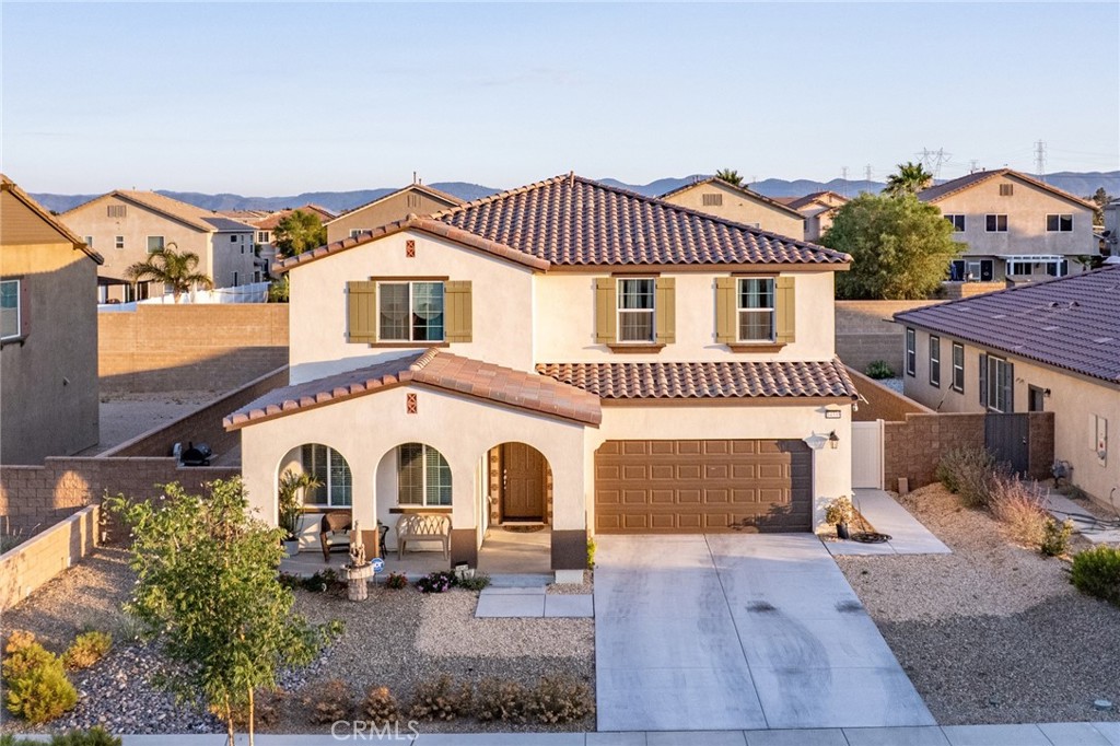 This beautifully maintained home offers over 3,000 sq ft of flexible living space and outstanding value. Though tax records list 5 bedrooms, the layout allows for personalized use, including a potential in-law suite. Inside, enjoy modern upgrades like new flooring, recessed lighting, and built-in surround sound. The chef’s kitchen features elegant countertops, a large pantry, soft-close cabinets, deep sinks, and upgraded faucets. Stainless steel appliances—including refrigerator, stove, and washer-dryer combo—are included. Additional highlights include updated ceiling fans, a redesigned staircase, modern light fixtures, and custom faux wood blinds throughout the first floor for added style and privacy. Upstairs offers three spacious bedrooms, two with oversized walk-in closets, plus a generous loft perfect for extra living space. The main floor’s open great room is ideal for entertaining or relaxing. Outside, the landscaped backyard features expansive concrete areas and a durable brick wall for privacy and low upkeep. This move-in ready home combines comfort, quality, and flexibility. Schedule your showing today!