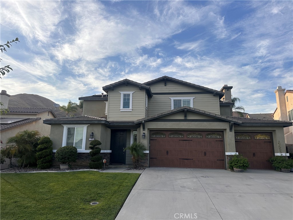 Welcome to 33966 Redhawk Place, a beautifully upgraded 4-bedroom, 3-bath home located in Yucaipa’s sought-after Chapman Heights community. This 2,617 sq ft residence sits on an expansive 10,768 sq ft lot with stunning mountain views and features a main-floor bedroom and bath, perfect for guests or multi-generational living. Renovated in 2017, the home boasts a modern kitchen with quartz countertops, custom pantry, upgraded flooring, and an oversized shower. Enjoy seamless indoor-outdoor living with a patio, outdoor kitchen, fire pit, and surround sound throughout. Additional highlights include plantation shutters, a cozy fireplace, 3-car garage with a 50-amp outlet, and thoughtful accessibility upgrades—all within a well-maintained neighborhood with low HOA dues.