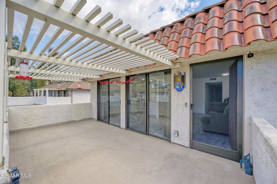 Light & Bright Village Green Condo in the Heart of Westlake Village.This beautifully located penthouse unit is filled with natural light and recently refreshed with new paint and flooring. The open floor plan connects the kitchen to the dining area and spacious living room, all opening to a large covered patio--perfect for indoor/outdoor living.The home offers two generously sized bedrooms, including a primary suite with a walk-in closet. Additional highlights include hallway storage, an in-unit stackable washer and dryer, a detached single-car garage, an extra parking space, plus ample guest parking nearby.Village Green residents enjoy resort-style amenities including a pool and spa, clubhouse, basketball court, and expansive greenbelt areas. Ideally situated just minutes from Westlake Lake, markets, shopping, and top-rated restaurants.