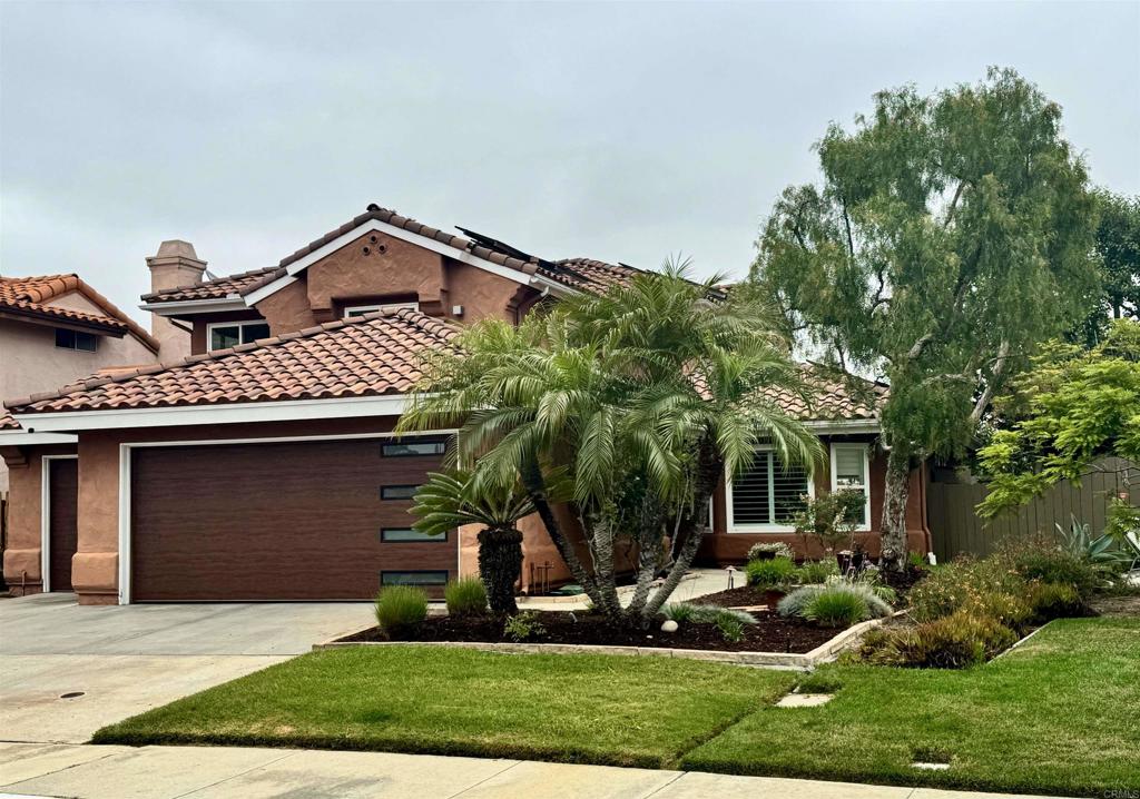 Welcome to this beautifully upgraded 4-bedroom, 3-bath home tucked away on a quiet cul-de-sac in the highly sought-after Santa Fe Ridge community of Carlsbad. This well-maintained residence offers peace of mind and modern comfort with owned solar, central air and heating, a Nest thermostat, and a Rachio smart sprinkler controller. Step inside to find remodeled bathrooms throughout and a stylishly updated kitchen featuring granite countertops. New tile flooring has been added in select downstairs rooms, and the entire home has been re-piped with copper plumbing for lasting durability. A new roof was installed in 2015, plus a security system adds an extra layer of protection. Ideally located within top-rated schools in the Encinitas and San Dieguito districts, this home also offers easy access to local parks, shopping centers, dining, beaches, golf courses, and all the best of North County living.