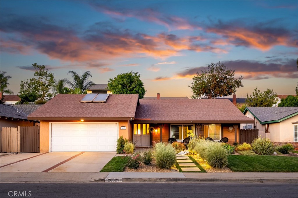 Step into this beautifully updated single-level home at 26621 Avenida Deseo in Mission Viejo. Covering 1,320 square feet, this 3-bedroom, 2-bathroom residence is nestled on a spacious 6,200 square foot lot. The property showcases a completely remodeled and thoughtfully constructed backyard with a fully covered patio and ceiling fan, ideal for relaxation or entertaining guests. Inside, you'll find a kitchen that’s been remodeled and refreshed with new paint, alongside tastefully redone bathrooms with custom flooring throughout. This home also offers access to Mission Viejo Lake, celebrated for its vibrant holiday events and mesmerizing concerts. Experience modern living in a delightful neighborhood with this exceptional home.