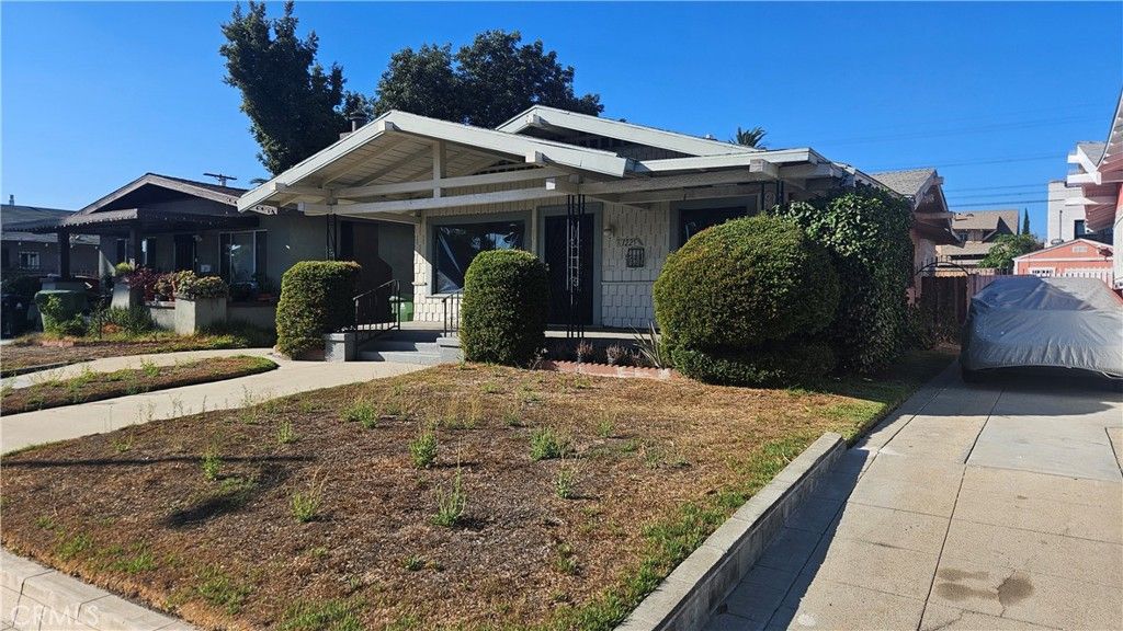 Photo of 1225 W 52nd Street, Los Angeles, CA 90037 (MLS # IG25231191)