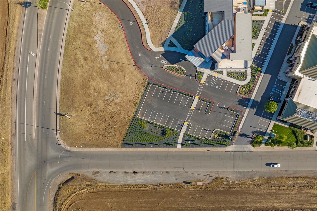This corner commercial lot fronts Bruce Road and sits in an ideal location between Skyway and 20th St. in Chico. The area has seen and will continue to see vast growth and development. The newly finished four-lane Bruce Rd allows for easy access for both Chico and the town of Paradise. Predominately surrounded by professional office and medical, this lot is primed to host your business. Development in the area includes Meriam Park, large residential subdivisions that include single family and muli-family, commerical businesses, a new school, parks, and recreation areas that will need services your business can provide. Neighboring businesses include, Orothopedics Associates, Enloe, Adventist Health Physical Therapy, Skyway Medical and more. Be apart of the new growth area in Chico! The adjacent lot of 1.02 acres is available and listed for sale if needing additional buillding area.