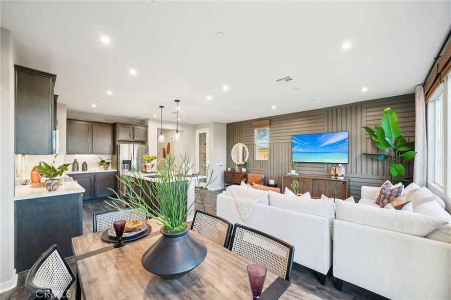 NEW CONSTRUCTION - SINGLE-FAMILY HOMES – NEW COMMUNITY! Welcome to Citrus & Summit – a brand, new collection of beautiful, single-family, detached, two-story homes with floor plans ranging from 1650 sq. ft to 1914 sq. ft in a gated community in Fontana. The Residence 1914 is a 4-bedroom plus loft, 3-bathroom two-story home, 1,914 sq. ft and features an attached 2-car garage. Open the door and you'll be instantly impressed with the Open-Concept Great Room, Dining and Kitchen area providing plenty of space for entertaining and gathering together. The gourmet Kitchen features beautiful shaker-style cabinetry with quartz countertops and stainless-steel electric appliances. The Main Floor Bedroom with walk-in closet and easy access to the Main Floor Full Bathroom offers a convenient and private space for guests, as a home office or extra space for your imagination. Upstairs, the large and spacious Primary Suite with large Primary Bath feel like a retreat with dual sink vanity, large walk-in shower and walk-in closet. Two additional bedrooms and bathroom and loft round out the second-floor features and the laundry room is conveniently situated between all these rooms, making laundry day a breeze. Among the features and finishes, homeowners will appreciate the unparalleled peace of mind in owning America’s Smart Home, Home is Connected. The Home is Connected package offers devices conveniently controlled through one application to stay connected to home around the clock.