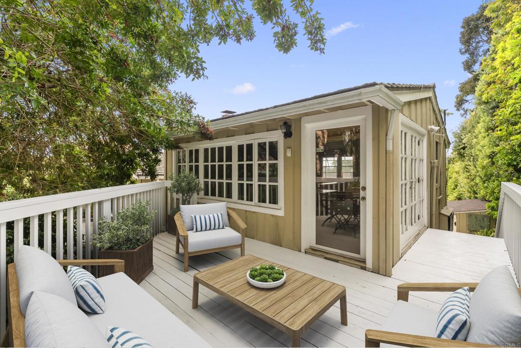 Classic Charm in the Village: Discover the charm of classic Rancho Santa Fe living at 6176 Calle Corte, a single-level ranch-style home ideally located in the heart of the village. Surrounded by mature landscaping, lush gardens, and fragrant citrus trees, this inviting residence offers a peaceful retreat. The interior is bathed in natural light through large windows, highlighting a living room with a cozy fireplace and a dining area that opens to a welcoming patio. Two spacious bedrooms and two full baths ensure comfort and privacy. The patio is ideal for year-round dining and entertaining in the favorable San Diego climate. Residents of 6176 Calle Corte enjoy the convenience of being just seconds away from the charming and historic village of Rancho Santa Fe, with its cafes, galleries, shops, restaurants, and the opportunity to acquire a membership to the iconic Rancho Santa Fe Golf Course and Tennis Club. Homeownership in the Covenant of Rancho Santa Fe also offers benefits such as a 24/7 community patrol, proximity to the highly rated K-8 public school, and access to recreation fields and over 60 miles of groomed walking and riding trails.