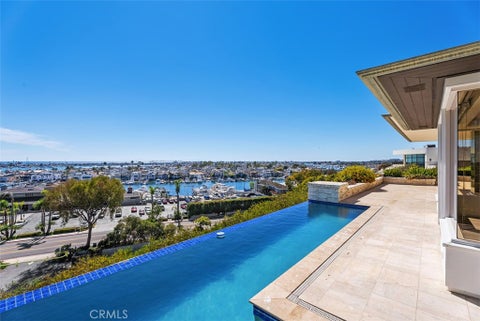 Photo of 1535 Dolphin Terrace Ter, Corona Del Mar, CA 92625 (MLS # NP26207122)