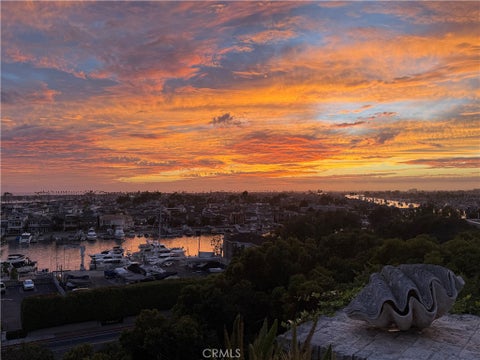 Photo of 1535 Dolphin Terrace Ter, Corona Del Mar, CA 92625 (MLS # NP26207122)