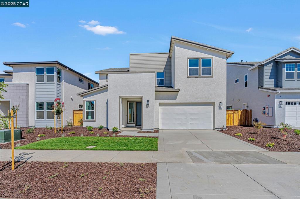Stunning Contemporary Residence 2 on cul de sac lot available! This luxury 4 bedroom home features an Jr suite with full bath on lower level for guests or extended family. Additionally, the home offers a gourmet island kitchen with an abundance of cabinets and large walk-in pantry, unique fitness room/office space, a spacious a glass office/den near entry, and sumptuous Primary suite complete with a free standing soaking tub and spacious shower make this home a MUST SEE. Also, there is an slider that connects the great room to the outdoor California Room making it a perfect home for entertaining both inside and out. Upper bonus room near the secondary bedrooms creates a special place for the kids or added entertainment space. SOLAR is INCLUDED and Price has been improved.