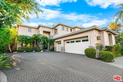 Photo of 10445 Amberwood Lane, Porter Ranch, CA 91326 (MLS # 26999465)