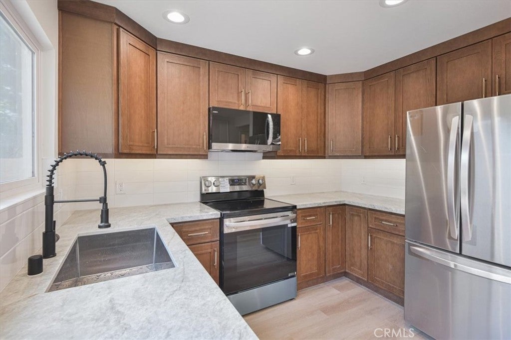 Photo of 229 Springview, Irvine, CA 92620 (MLS # OC26147560)