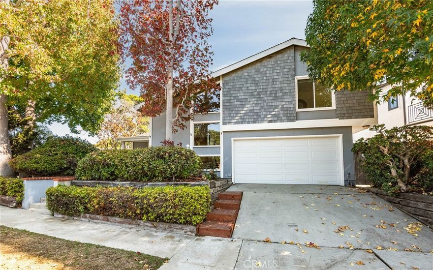 The opportunity you have been waiting for is finally here! Welcome to this charming, remodeled home located in a prime part of the desirable Manhattan Heights neighborhood. The vaulted ceiling entryway flows right into the bright, open floor plan. The kitchen is open to the dining and living spaces and features Venatino quartz countertops with a breakfast bar and stainless cooktop. Get cozy next to the fireplace in the living room while you sit back and watch the action in the kitchen and private, lush backyard! The windows and doors in the rear of the house are wide enough to provide the indoor/outdoor feel that everyone desires. Primary bedroom is conveniently located downstairs and the two bedrooms upstairs share a 3/4 bath. Magnolia is a special street with low traffic, great neighbors and sufficient parking.