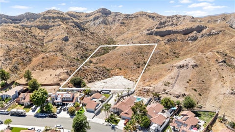 Photo of 15221 Poppy Meadow ST, Canyon Country, CA 91387 (MLS # SR26128476)