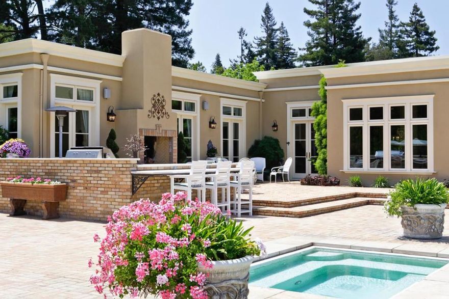 Exuding the magnificence of a grand and elegant residence, the serene villa weaves a spell of enchantment that invigorates the mind and spirit. Single level custom home on approx 2.5 acres. Extraordinary grounds. 4 car attached garage plus 3 car detached garage with separate entrance. Luxurious appointments and dramatic presentation.