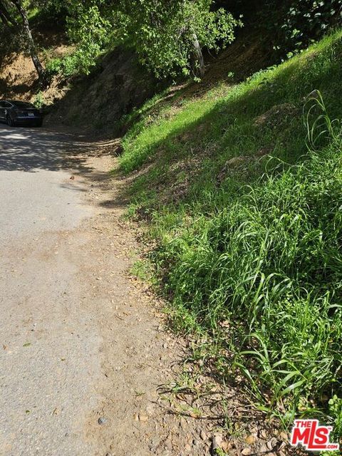 Photo of 10468 Scenario Lane, Los Angeles, CA 90077 (MLS # 25521403)
