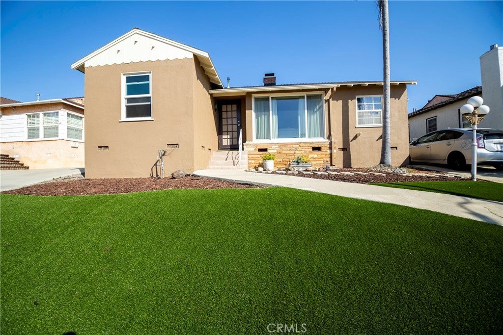 Photo of 11642 Ruthelen ST, Los Angeles, CA 90047 (MLS # IN26225662)