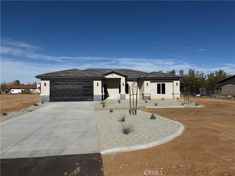Photo of 11182 Caribou Avenue, Apple Valley, CA 92307 (MLS # CV25267546)