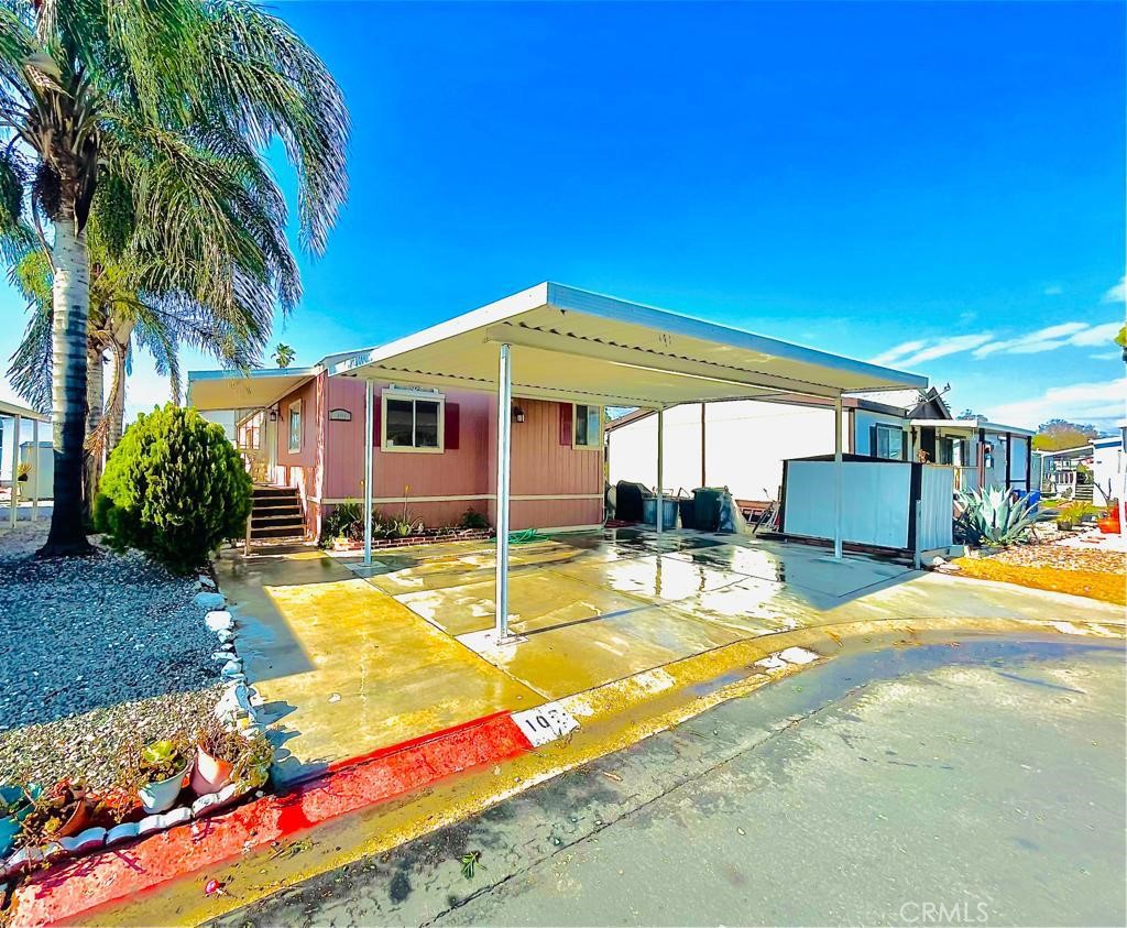 Lovely manufactured home located at the Country Meadow mobile home park featuring 3 bedrooms 2 bathrooms and a carport for parking for 2 cars side by side. Built in 1998.
