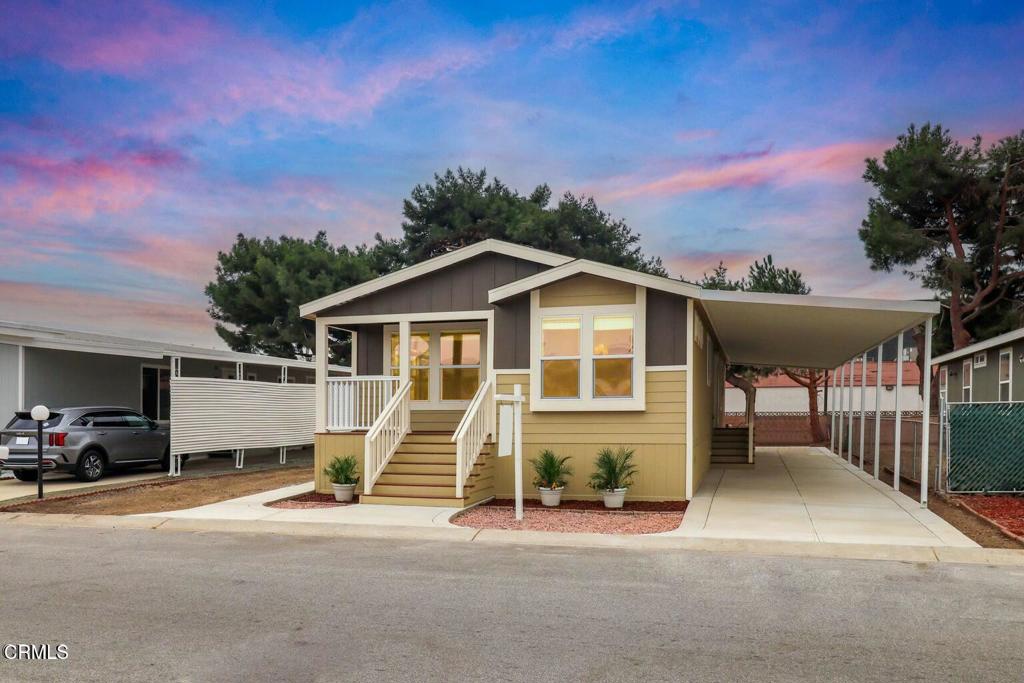 Discover a serene and modern lifestyle in this newer 3 bedroom 2 bathrooms gorgeous manufactured home within the exclusive Imperial Senior Park 55+. Space rent $1,100 a month. Enjoy the comfort of upscale and custom details throughout, including the newer wood-like SPC flooring, plush carpeting, and a beautifully and generous size living and dining areas, newer kitchen with stainless steel appliances. Featuring a spacious kitchen island with ample cabinetry, double sinking the kitchen. Walk in closet. Fans in living room and master bedroom. Two sinks in the master bath and plenty of cabinet storage and step in shower. This awesome home also incorporates earth-quake-resistant features, offering enhanced protection agains seismic activity. Nestled in the heart of Oxnard, this residence offers easy access to nearby beaches, easy access to Malibu and local amenities. Relax in the nice porch, perfect for enjoying the near by ocean breeze. The vibrant community clubhouse provides a wealth of amenities and activities to enrich your lifestyle. Enjoy leisurely swims in the large heated pool, relax in the soothing Spa, engage in friendly games of pool, immerse yourself in literary pursuit in the inviting library, or socialize with fellow residents in the extra large and well equipped kitchen. Perfect to organize gatherings. Don't miss this opportunity to experience the ultimate in Senior living. Buyer must provide income 3 times the space rent. Schedule your private tour today!