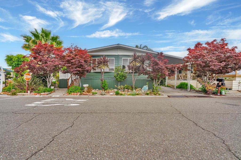 This charming 2 bedroom, 2 bath home is situated in Hayward's age-restricted community of Spanish Ranch 2. The flexible layout features stunning laminate flooring that flows from the generous living and family rooms through to the kitchen and dining area, leading down the hallway to the master bedroom. The spacious kitchen boasts plenty of cabinets for storage, elegant stone countertops, and stainless steel appliances. Further down the hall, the expansive master suite includes a large mirrored closet, dual sinks, and a corner sunken tub. Additional highlights include a wet bar and a built-in hutch in the dining area. The home also comes with a storage shed, washer, and dryer. This great home offers a multitude of comfort qualities.