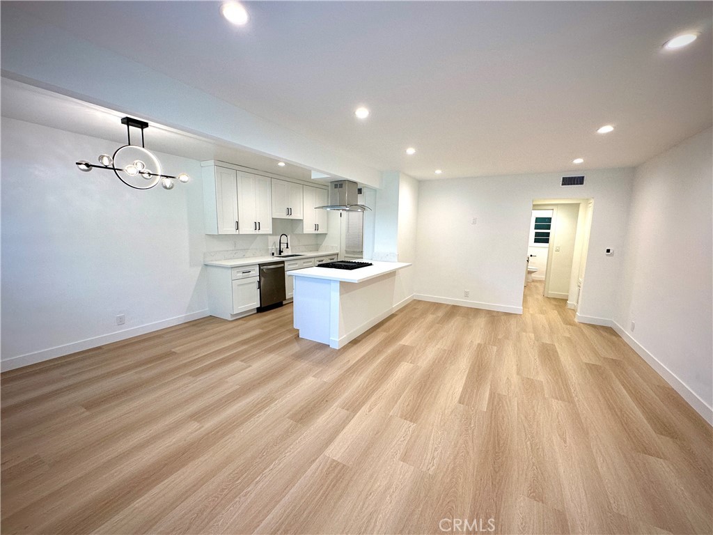 Welcome to this beautifully renovated 1-bedroom, 1-bath apartment nestled in the highly desirable Verdugo Woodlands neighborhood. This thoughtfully upgraded residence combines modern style with everyday convenience in one of Glendale’s most charming communities.
Step inside to find newly installed wood plank flooring that flows seamlessly throughout the space, paired with brand-new windows that flood the home with natural light. Enjoy year-round comfort with a brand-new central air conditioning and heating system, and the added luxury of your own in-unit washer and dryer.
The sleek, modern kitchen features white shaker cabinets, brand-new stainless steel appliances including a dishwasher, and ample counter space for all your culinary needs. A dedicated dining nook provides the perfect setting for intimate meals, enhanced by elegant wainscoting that adds classic charm.
The fully remodeled bathroom offers a spa-like feel with contemporary finishes and thoughtful design. Spacious and inviting, the bedroom offers a peaceful retreat with generous closet space and serene views of the neighborhood.
Situated in a quiet, well-kept residential area, you're just minutes from popular restaurants, cozy cafés, and boutique shops. Enjoy the tranquility of Verdugo Woodlands while being close to major freeways for easy commuting. Friendly neighbors and a welcoming community complete the experience.
Don’t miss your chance to enjoy stylish, comfortable living in one of Glendale’s most sought-after neighborhoods!