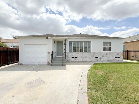 Photo of 1410 W School Street, Compton, CA 90220 (MLS # IG26071723)