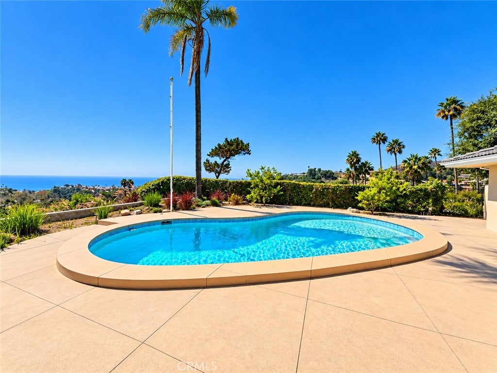 Photo of 1156 Las Pulgas Pl, Pacific Palisades, CA 90272 (MLS # SR26216520)