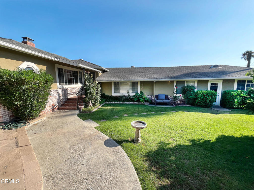 Welcome to your serene sanctuary in the beautiful hills of La Crescenta! As you approach, the inviting entrance hints at the charm that awaits within this modern 4-bedroom, 2-bathroom hideaway. Step through the wrought iron gate and down the stone steps, surrounded by lush rose bushes, and you'll find yourself in a world of tranquility--your forever home!Imagine waking up to the gentle sounds of nature, with a peaceful bird chorus greeting you each morning. The front garden is a delightful secret garden, brimming with vibrant plants and tall hedges that offer both beauty and privacy.As you enter the welcoming foyer, sunlight dances on the warm hardwood floors, creating a cozy ambiance. The heart of the home features a stunning stone fireplace, perfect for gathering with family and friends on chilly evenings. The inviting kitchen and dining area are designed for both functionality and warmth, boasting beautiful wood cabinets and granite countertops. Picture enjoying your morning coffee at the barstool seating, all while gazing at breathtaking mountain views through charming windows.The home's unique layout includes two separate wings, offering both privacy and connection. Down one hallway, you'll discover three spacious bedrooms, each featuring large landscape windows and ample closet space. The nearby bathroom provides easy access and even includes a scenic view of the backyard.To the right of the foyer, the master retreat awaits--a true sanctuary! A few steps lead you to a generous main room, complete with its own den, perfect for an office or home gym. With double-swing doors, you can enjoy both privacy and openness. The connecting bathroom and extensive closet space add to the allure, and the best part? Direct access to the charming outdoor deck, where you can unwind with outdoor lounge furniture and savor stunning sunset views over lush hedges and rolling peaks.Step outside to your personal oasis, featuring a hot tub right next to a cozy fire pit--ideal for evening gatherings with family and friends. The spacious two-car garage offers plenty of extra storage, housing your updated washer and dryer, plus you'll enjoy fresh fruit from your own Fig and Orange trees.This remarkable home, nestled in privacy and surrounded by nature, offers a unique serenity. Don't miss the chance to experience the beauty and warmth of this enchanting retreat--schedule your tour today!