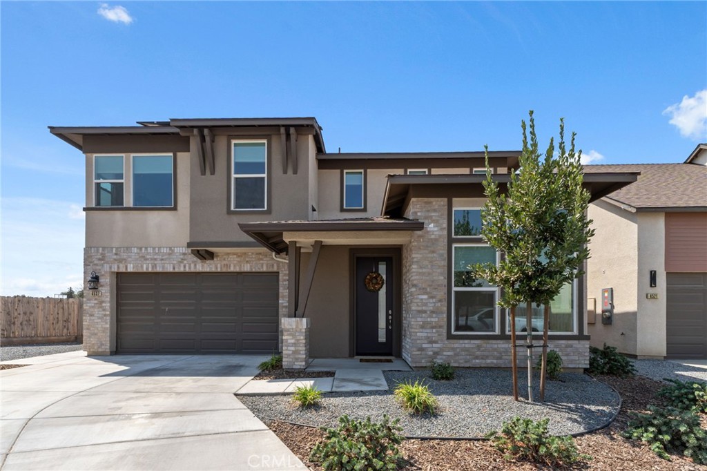 Welcome to Southern Highlands, one of Visalia's most exclusive gated communities. Built by Summit Homebuilders on a pool-sized lot, this residence blends thoughtful design with high-end finishes and the benefit of owned solar for energy efficiency. The versatile floor plan includes two primary suites,one downstairs with a walk-in shower and bench, and another upstairs with a spa-inspired bath, dual sinks, and an oversized walk-in closet. Expansive custom windows fill the home with natural light, while honeycomb shades provide comfort and style. The chef's kitchen is a true centerpiece, featuring quartz countertops, Whirlpool appliances, a deep ceramic sink, and a striking hood above the gas cooktop. A half bath near the entry adds convenience for guests.
Additional highlights include a high-end drywall finish, tile flooring throughout the main living spaces, and plush carpet in the upstairs rec room, bedrooms, and staircase. This exceptional property offers the ideal combination of luxury, efficiency, and comfortall in a prestigious neighborhood setting.