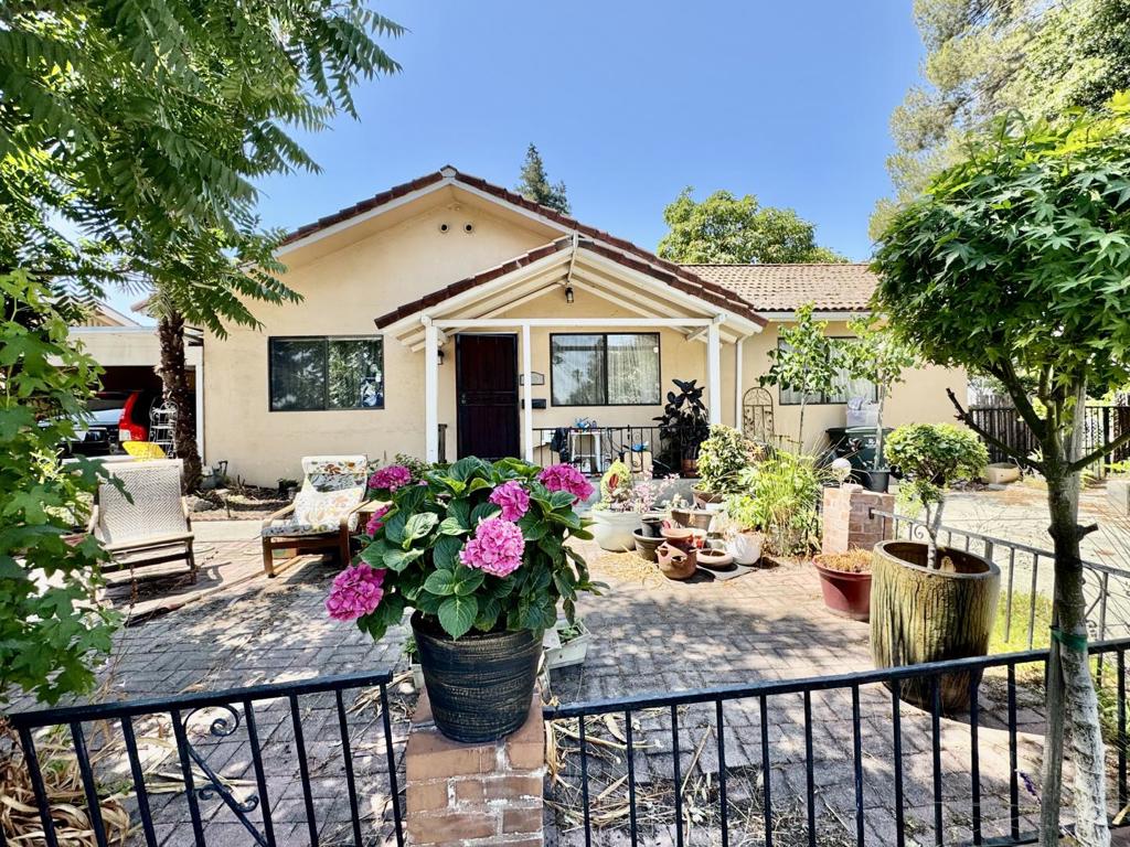 Welcome to this 3-bedroom, 2-bathroom home located in the vibrant city of Mountain View. Spanning 1,410 sqft (buyer to verify), this residence offers a comfortable and functional layout. The kitchen seamlessly connects to the family room, creating an inviting open space perfect for gatherings. The home features central forced air heating, ensuring year-round comfort. While there is no garage, ample space is available for parking. The flooring throughout the home adds to its appeal and easy maintenance. Conveniently situated within the Mountain View Whisman School District, this property provides access to local educational facilities. With a lot size of 6,408 sqft (buyer to verify), there's plenty of room for outdoor activities and gardening. Experience the best of Mountain View living in this home.