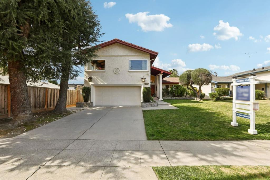 Welcome to your new home in vibrant San Jose! This spacious 2,482 sq ft residence offers four bedrooms and three full bathrooms, with a convenient ground floor bedroom and full bath for versatile living arrangements. The kitchen is a modern chef's dream, featuring quartz countertops, a dishwasher, exhaust fan, microwave, and refrigerator, perfect for culinary enthusiasts. The home boasts a separate family room, a formal dining room, and a cozy breakfast nook, allowing ample space for gatherings and daily life. Enjoy the beautiful flooring throughout the home, comprised of marble, tile, and other quality materials. The inviting fireplace adds warmth and ambiance to the living area. Additional features include central AC and heating powered by Energy Star HVAC, ensuring comfort year-round. The walk-in closet provides convenient storage, and the utility room houses your laundry needs. Situated on a 6,300 sq ft lot, this property is within the Oak Grove Elementary School District. With a two-car garage and numerous energy-efficient features, this home is an ideal blend of style and functionality in the heart of San Jose.