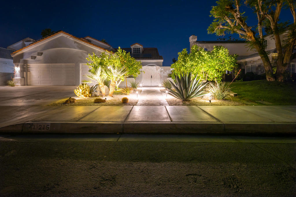 Welcome to 41215 Carlotta Drive, an elegant and fully furnished desert retreat offering sweeping golf course frontage, unobstructed views of the San Jacinto Mountains, and luxurious indoor-outdoor living. Enjoy your morning coffee and evening tea with the wonderful views offered by this vacation getaway. This beautifully maintained 4-bedroom, 3-bathroom home is a perfect seasonal getaway or short-term vacation rental, designed to capture the essence of the Palm Desert lifestyle. Please see the virtual tour. https://my.matterport.com/show/?m=bhVeBpioQcXInside, the home boasts a bright, open layout with vaulted ceilings and large windows that frame the dramatic natural surroundings. The living room is warm and inviting, centered around a cozy fireplace, while the adjacent kitchen features granite countertops, stainless steel appliances, and ample room for entertaining. Stylish furnishings and curated decor throughout create a turnkey experience for guests. The spacious primary suite includes direct backyard access, a walk-in closet, and a spa-like bath, while the additional bedrooms offer comfort and flexibility.Step outside to discover your private backyard paradise. Overlooking the fairways of The Lakes Golf Course, the outdoor space includes a sparkling pool and spa, a covered patio for lounging or al fresco dining, and a custom gas firepit--perfect for cool desert evenings. A dedicated TV watching area enhances the entertainment options, allowing you to enjoy your favorite shows or sports with mountain views in the background.Set in a peaceful Palm Desert neighborhood not affiliated with The Lakes Country Club, this home is ideally located just minutes from El Paseo shopping, fine dining, golf, and hiking. Offered fully furnished for vacation rental, this property is an exceptional find for snowbirds, families, or anyone looking for a turnkey escape in the Coachella Valley.Minimum 30 days rental. Rates Fluctuate based on season.May - September - $7500/monthNovember/December $8,000/monthJanuary - April $9,000/monthRates Negotiable if term exceeds 30 days.