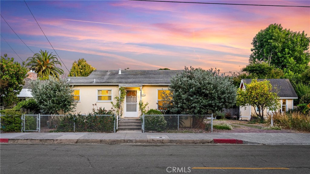Introducing "Railhouse Cottage" —a rare opportunity in the heart of San Luis Obispo. With an R-2 zoning this lot allows for two single-family residences, making it perfect for investors, developers, or those looking to create a multi-generational living setup.
Located in the desirable Railroad District, just blocks from Downtown and directly across from Mitchell Park, this 2-bedroom, 1-bath bungalow sits on a prime lot with endless potential. Live in the existing home while you plan your second residence, or explore building two new homes from the ground up.
Enjoy unbeatable walkability — minutes to the Thursday Night Farmers’ Market, the SLO Food Co-op, local coffee shops, restaurants, and more.
Whether you’re looking to build, invest, or simply enjoy all that San Luis Obispo has to offer, this is a property that checks all the boxes.
