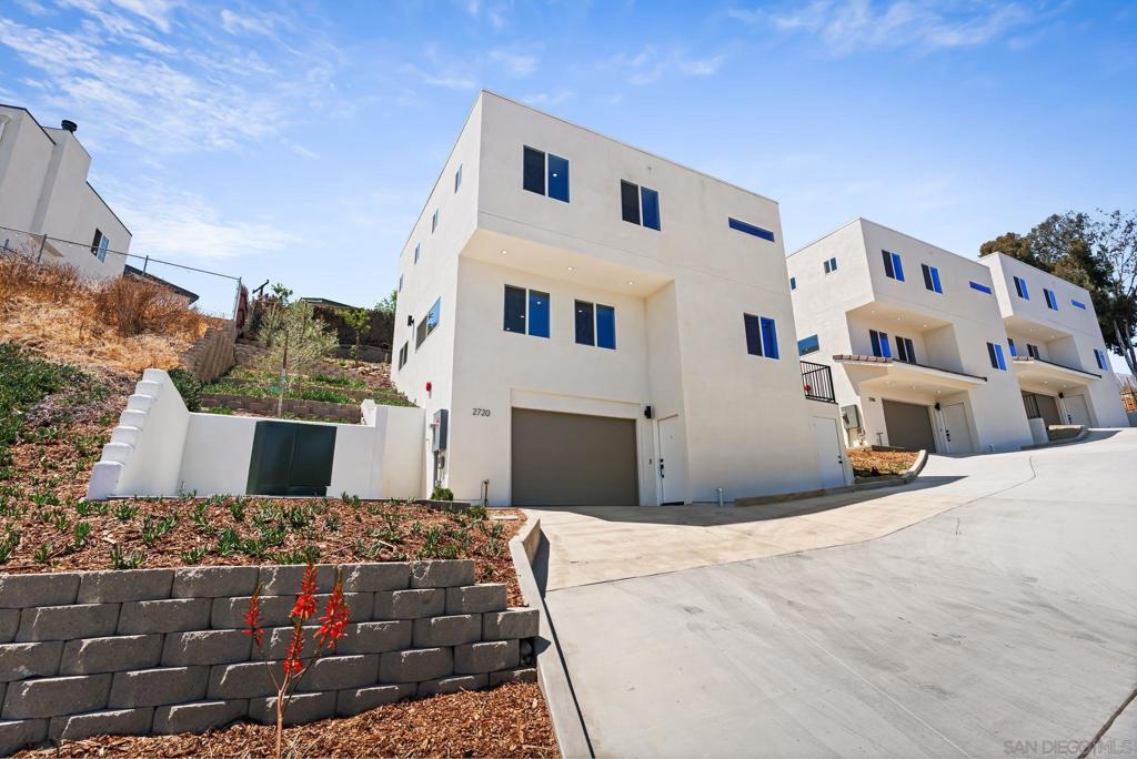 BRAND NEW CONSTRUCTION with PAID SOLAR in the heart of Paradise Hills! Nestled in a private enclave of just three homes, this thoughtfully designed 3 bedroom, 2.5 bathroom residence showcases fresh, modern finishes throughout and an open-concept main level that connects the kitchen, dining, and family room—ideal for everyday living and entertaining. Large windows bring in great natural light and capture peaceful hillside views. The primary suite offers an ensuite bath and a serene outlook. Enjoy San Diego living with easy freeway access, a quick drive to downtown, and close proximity to the Chula Vista Golf Course, local shops, rolling hills, and scenic hiking trails.