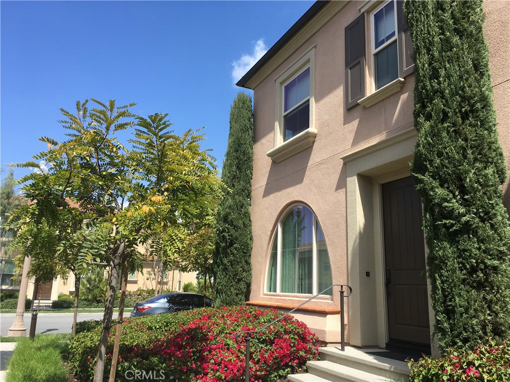 Situated in the prime location of Cypress Village. Walk only one block to Cypress Village Elementary School and community park. A light and bright corner unit. This Residence features 3 bedrooms, 3.5 bathrooms, a loft and approximately 1,862 sf of living space. One of the rare models that each bedroom has its own bathroom within the bedroom. This home offers the finest interior upgrades such as hardwood and porcelain tile flooring, custom fitted shades, recessed lighting, chef-thermador stainless steel appliances, gourmet kitchen with caesarstone countertops, and reverse Osmosis water filter system for hot and cold drinking water right at the sink, and water softener in the garage. A sliding door leads to a private outdoor patio. Only 5 minutes drive to FWY 5, supermarkets and restaurants, hospitals, the Great Park. 10-15 minutes drive to John Wayne Airport, and the Irvine Spectrum.